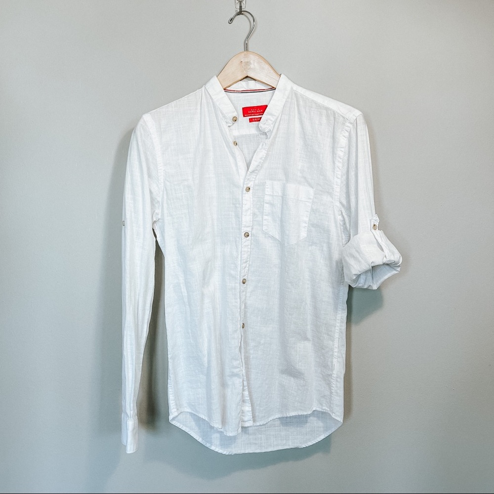 Shirt with roll sleeve tabs